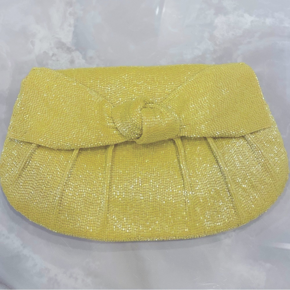 Free People yellow knot beaded clutch bag
